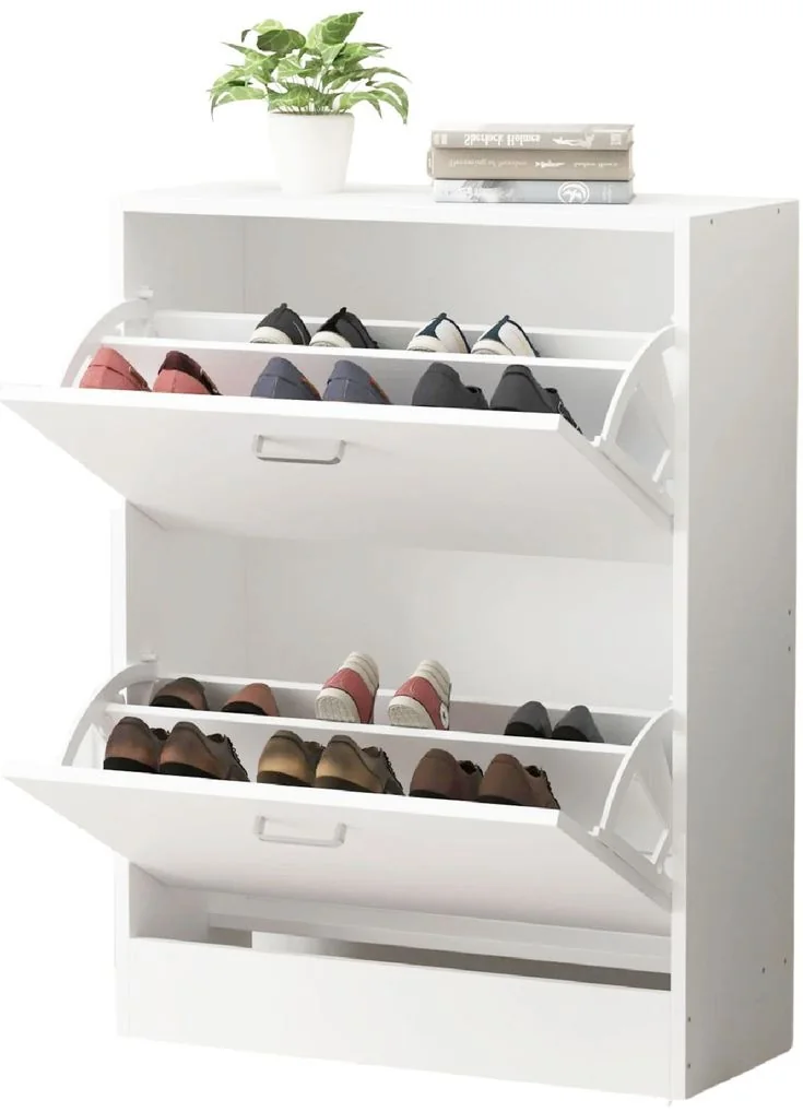A white shoe cabinet has two open tilting compartments filled with shoes.