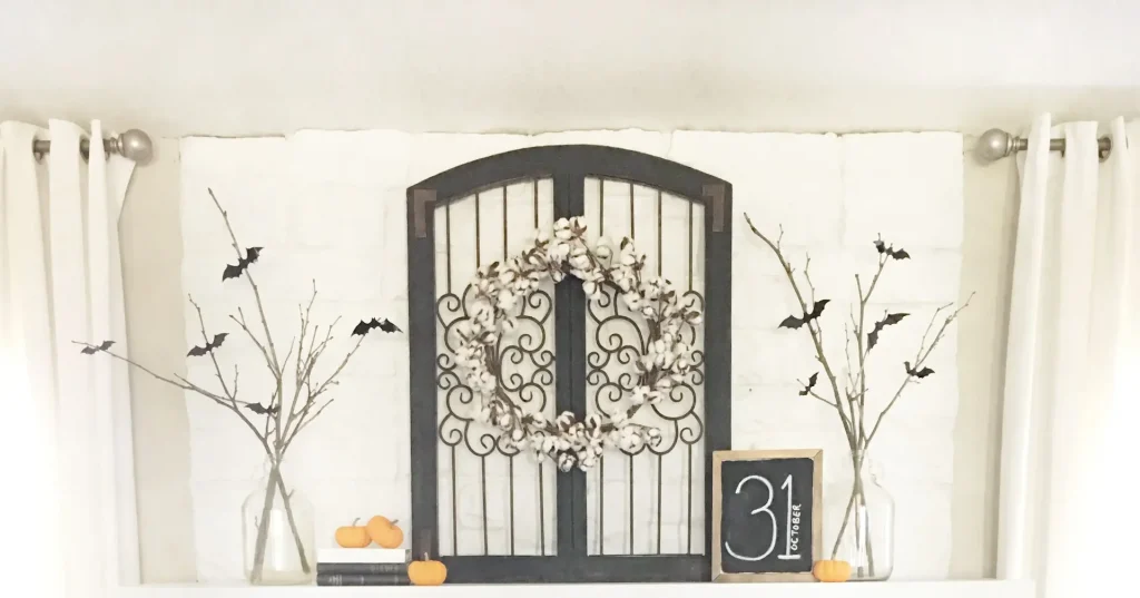 Halloween Mantel Decor Ideas with Bats, Banners and Pumpkins